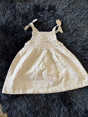 GB Baby strappy bow dress in cream. Crochet top.